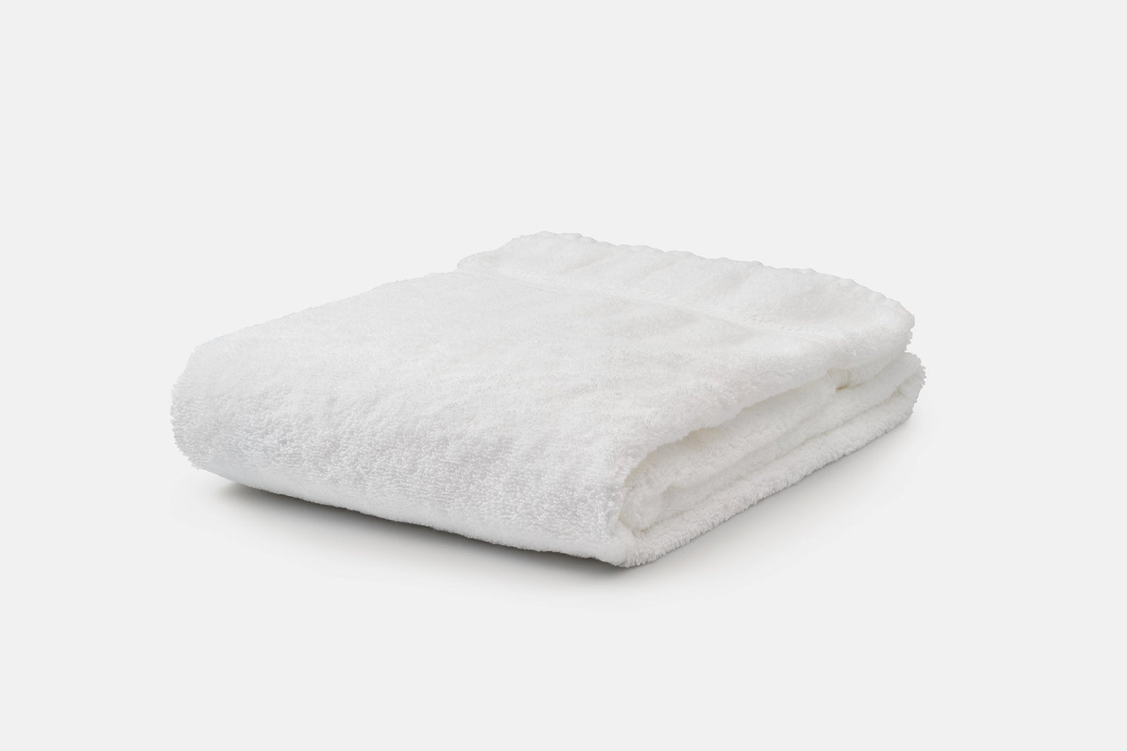 Folded Bath Towel Color White Bath Towels Ethically Made Luxury Cotton Made in USA