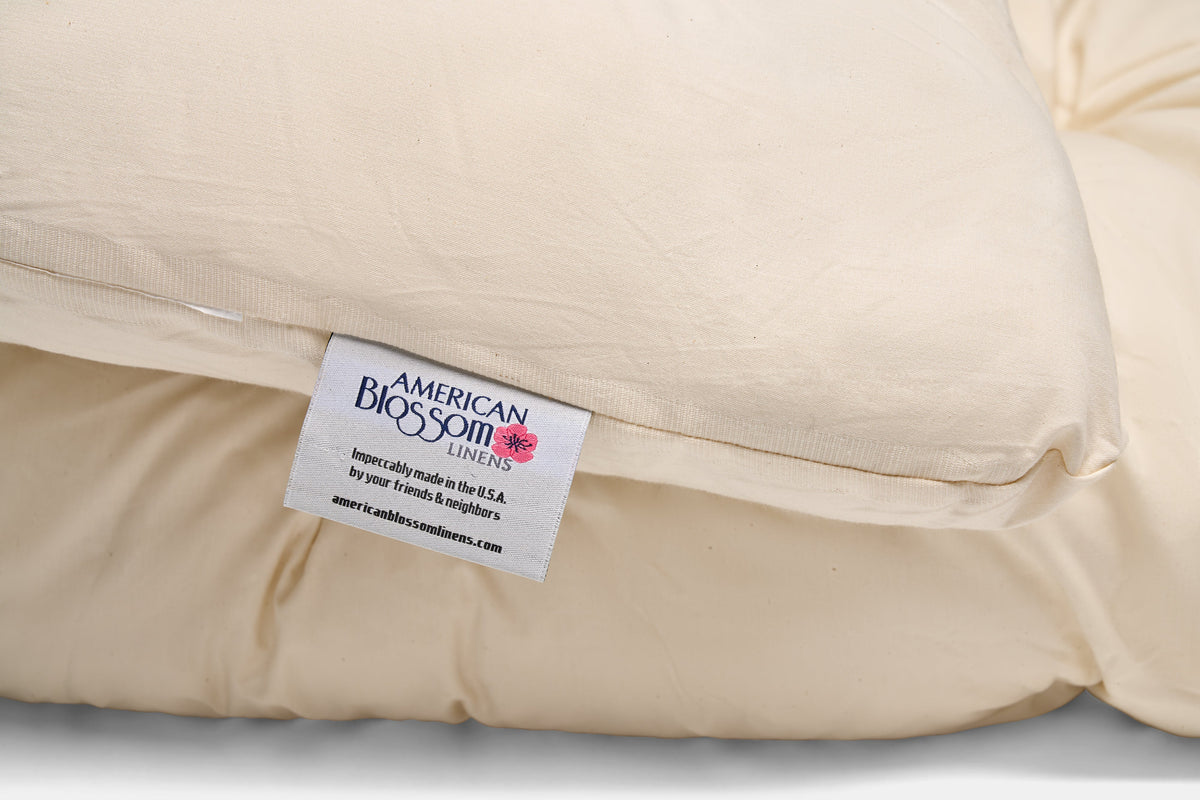 Tag on wool mattress topper