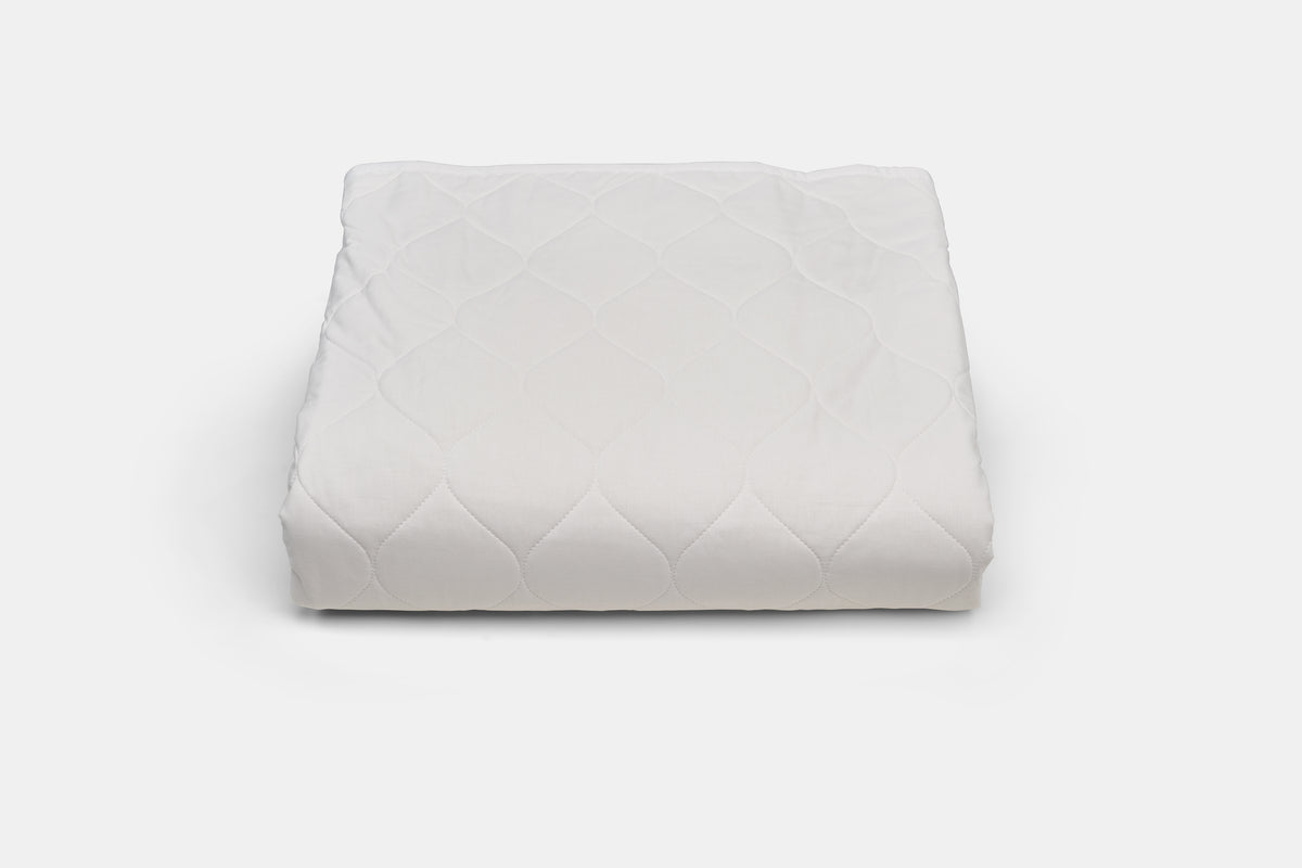 White quilted bedspread