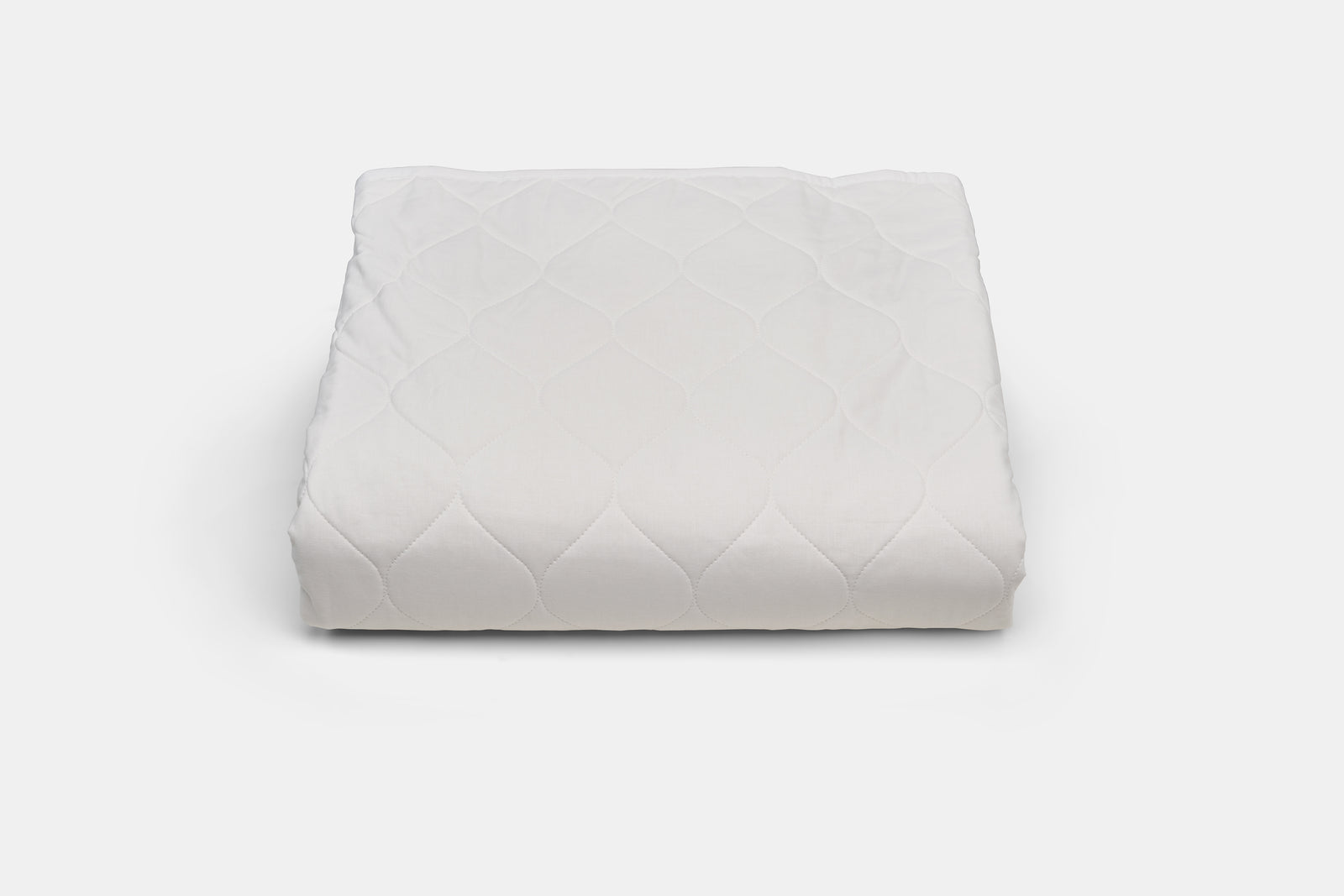 White quilted bedspread