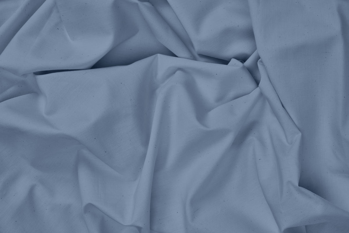 Light blue irregular cotton flat bed sheet with classic piping design